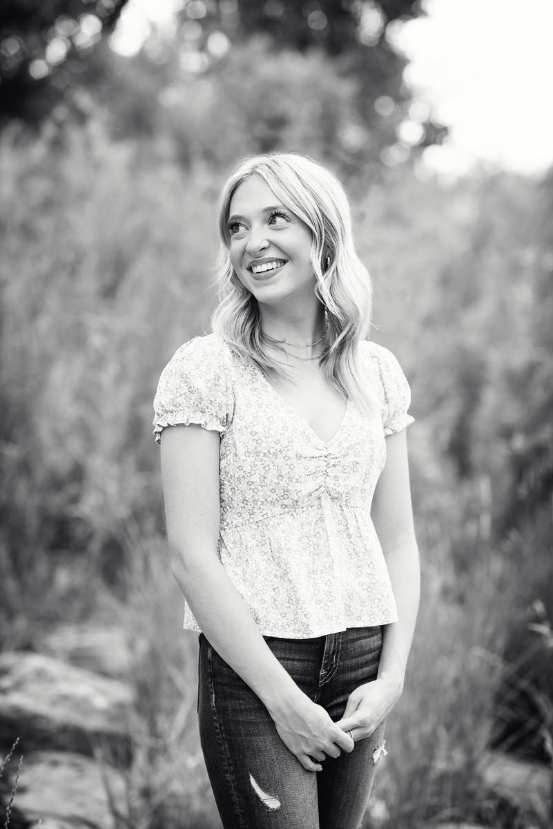 black and white high school senior picture girl in nature