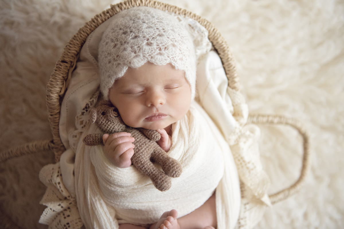 In Home newborn photographer in Aurora Colorado | Baby girl in basket prop